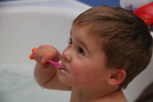 Toddler brushing teeth